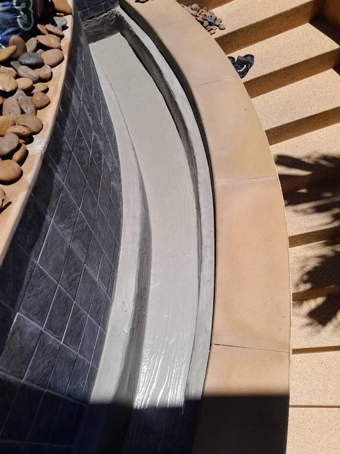 Completed overflow gutter after waterproofing and repainting in Phuket