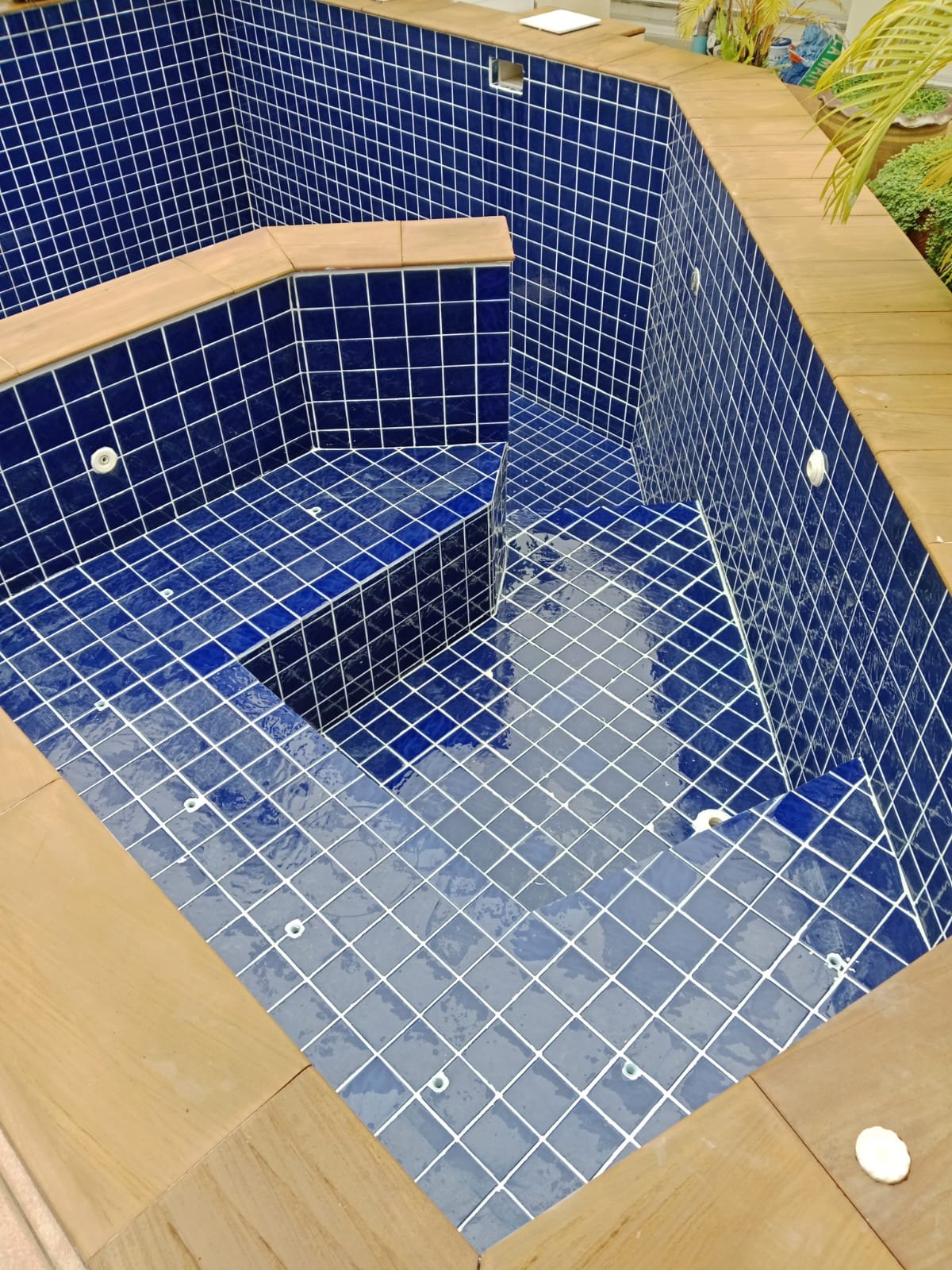 Completed swimming pool after tile replacement and regrouting in Phuket