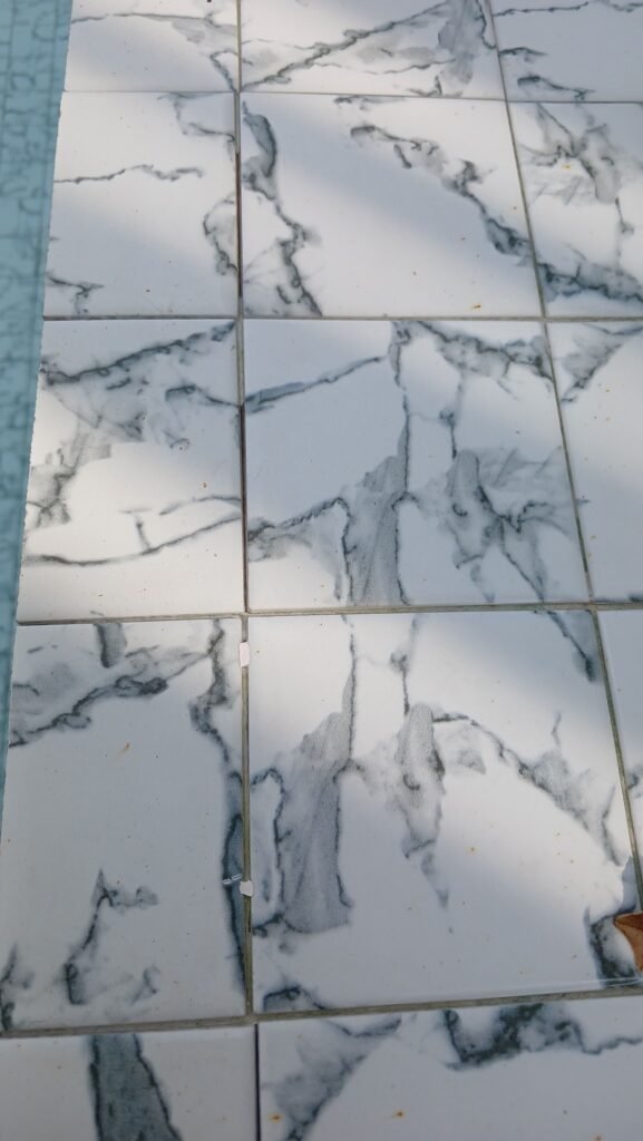 Cloudy pool water caused by damaged grout in swimming pool Phuket